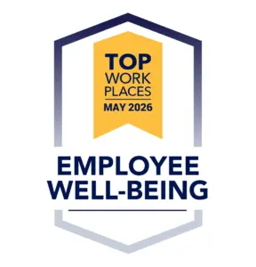 TWP-CE_Employee-Wellbeing_May_2026 Award badge saying Top Work Places May 2026 with a yellow shield and 'Employee Well-Being' text underneath.