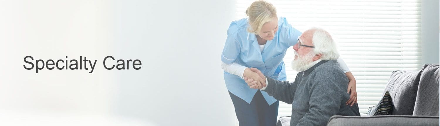 Specialty care provider helping elderly man stand up