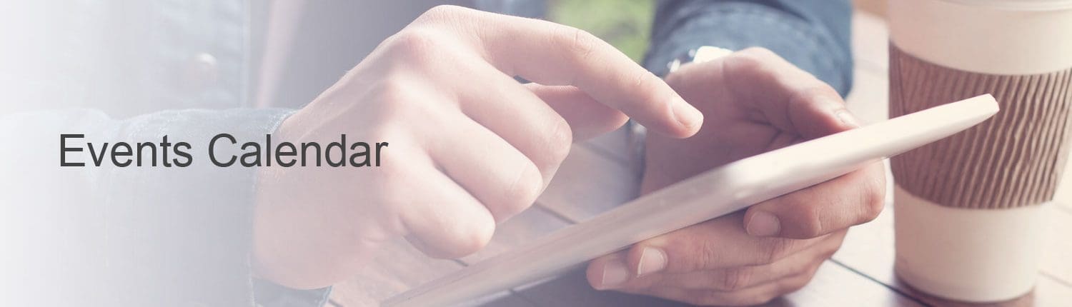 Man using iPad to check upcoming events