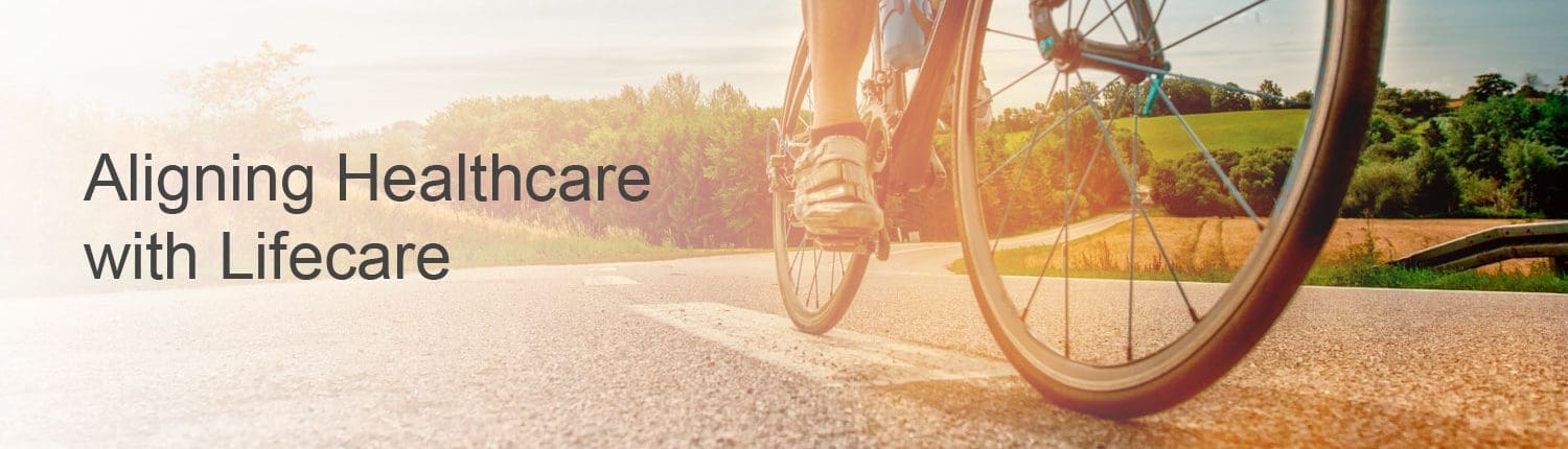 Man riding bicycle on country highway