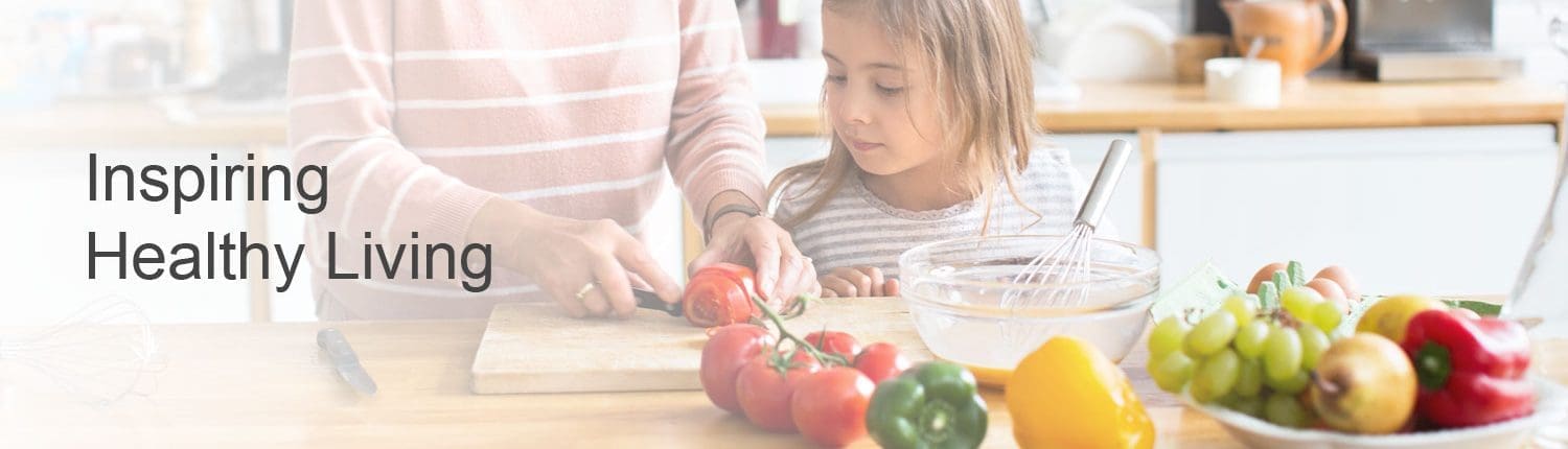 Grandmother teaching granddaughter how to cook