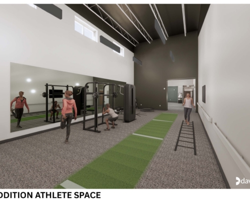 Interior gym/workout space with resistance machines, mirrors, and trainees exercising; high ceiling and modern design.